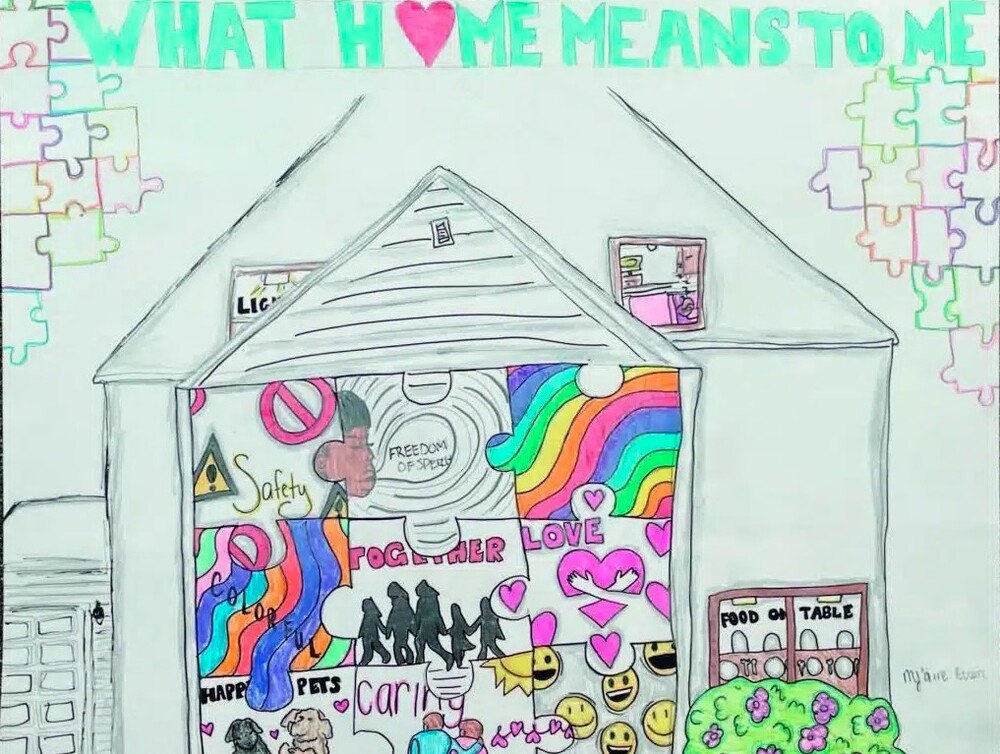 A house filled with puzzle pieces with various picture of the meanings of what home means to the artist.